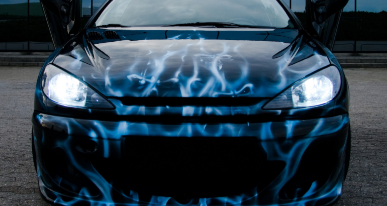 Artcal - Front View Of Car With Blue Fire Decals On Hood And Bumper - Creative Uses For Decals Blog